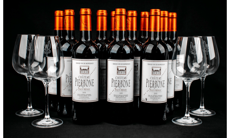 12 bottles of Chateau Pierbone with 4 Regimental Glasses