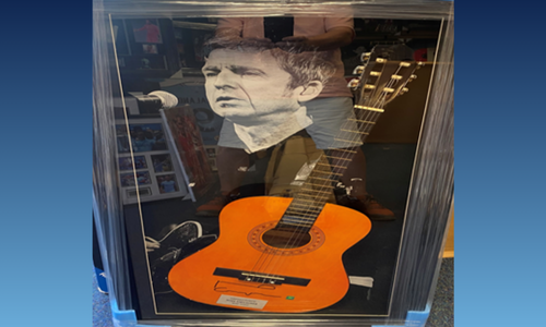 Noel Gallagher Signed Acoustic Guitar – Framed Memorabilia Masterpiece