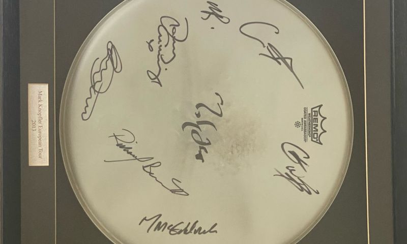 Framed Dire Straits signed drum skin
