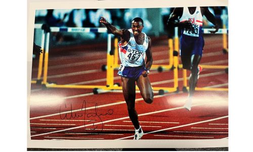 Signed photo of former sprint & hurdling athlete, Colin Jackson