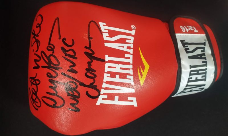 SIGNED BOXING GLOVE BY NIGEL BENN